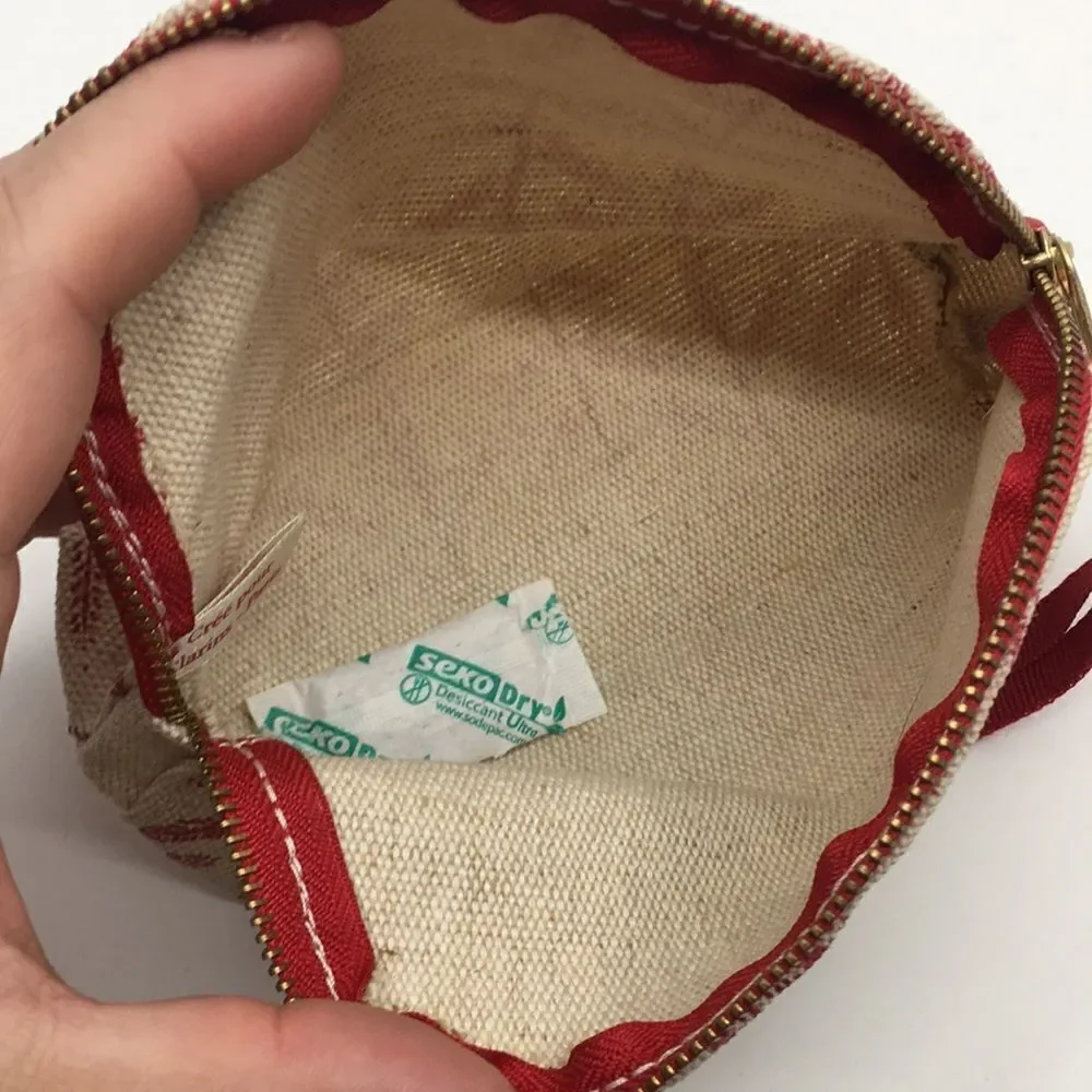 FEED 10 Clarins makeup cosmetics light tan and red carry-all pouch